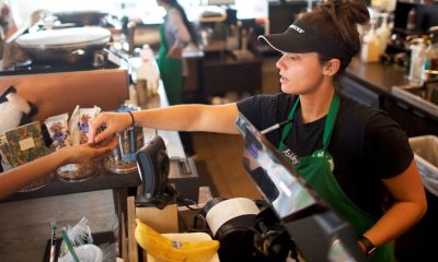 Starbucks to award bonuses to baristas, expand tipping