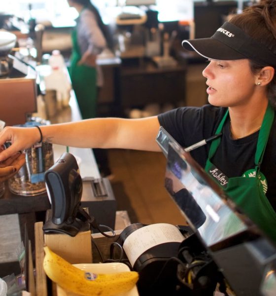 Starbucks to award bonuses to baristas, expand tipping