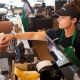 Starbucks to award bonuses to baristas, expand tipping
