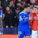 SL Benfica's Argentine forward Gianluca Prestianni hides his mouth while arguing with Real Madrid's Brazilian forward Vinicius Junior