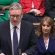 Keir Starmer stands to speak at PMQs on 22 April 2026