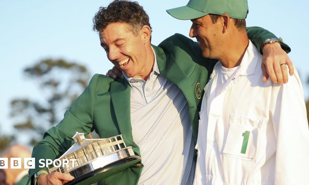 Rory McIlroy celebrates winning the Masters title