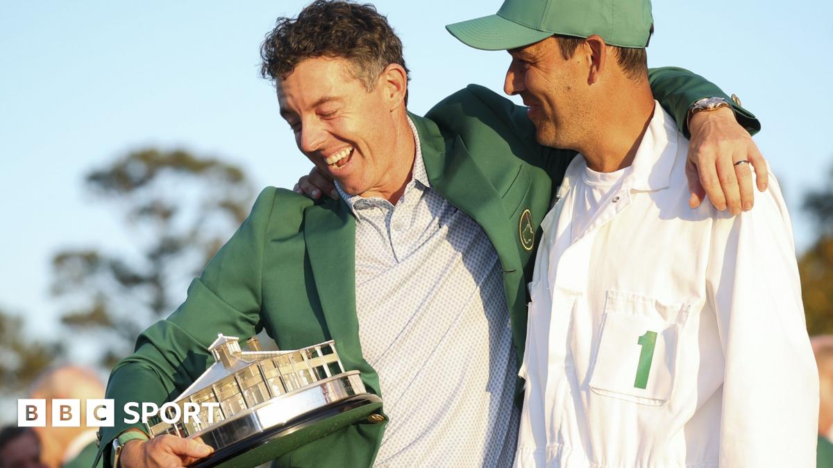 Rory McIlroy celebrates winning the Masters title