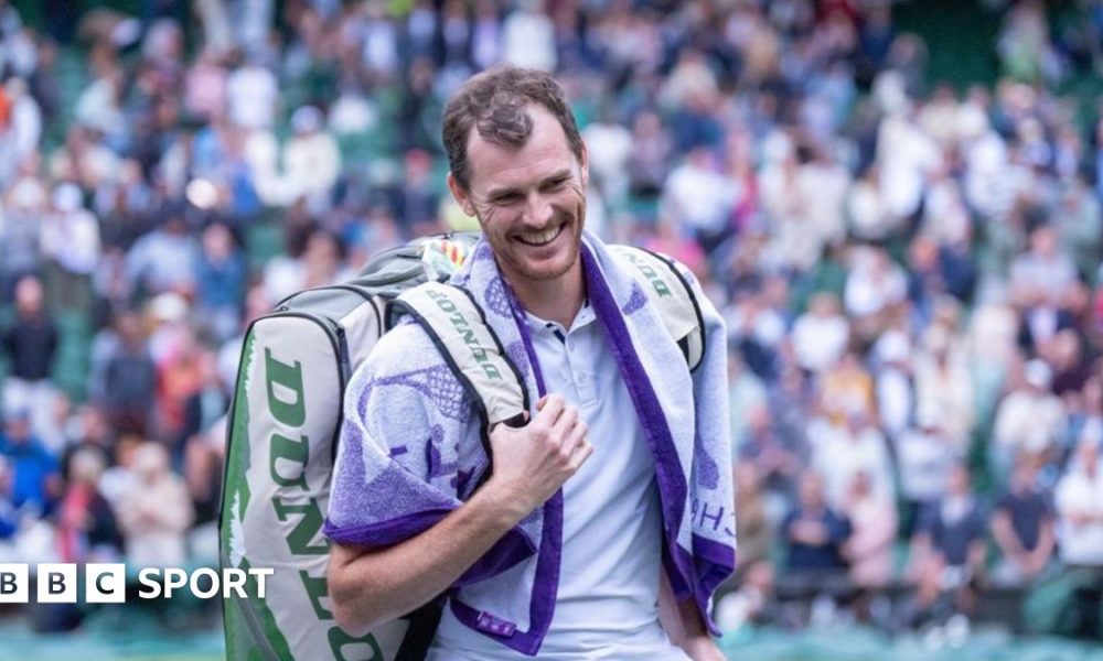 Jamie and Andy Murray touch hands