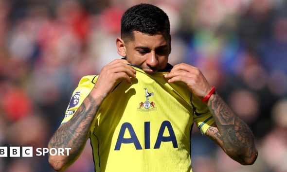 Tottenham's Cristian Romero bites his shirt as he is substituted in their Premier League game against Sunderland