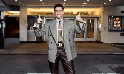 2 Dan Levy In Grey Pinstripe Versace Spring 2026 Blazer Brown Leather Pants And Silk Shirt At Big Mistakes Premiere
