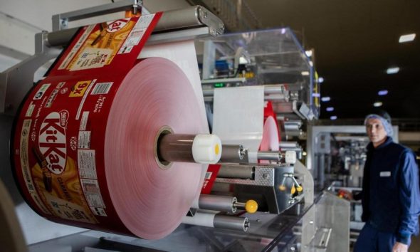 KitKat truck flanked by security convoy in Toronto, Canada