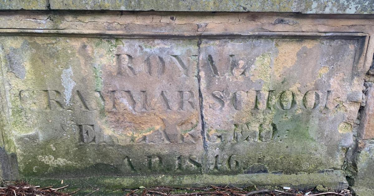 The churchyard stone that marks Darlington’s grammar school history
