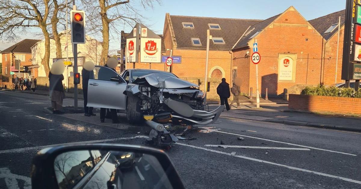 Wigan Road crash brings down traffic lights on island