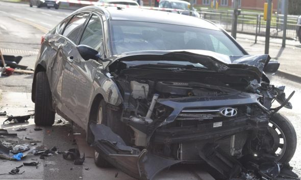 Man arrested after crash causes rush-hour disruption in Bolton