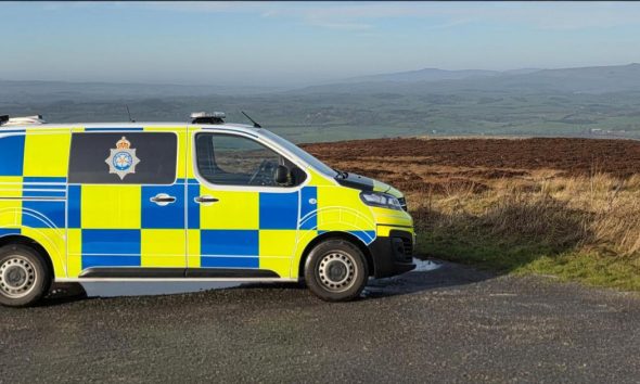 Grey and orange Hitachi digger stolen from Oswaldkirk