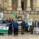 Pro-Palestine protesters gather outside Bolton Town Hall