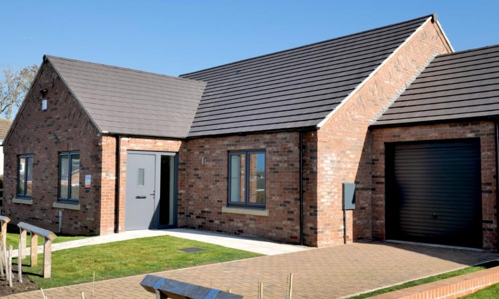 Low-carbon bungalows completed in village