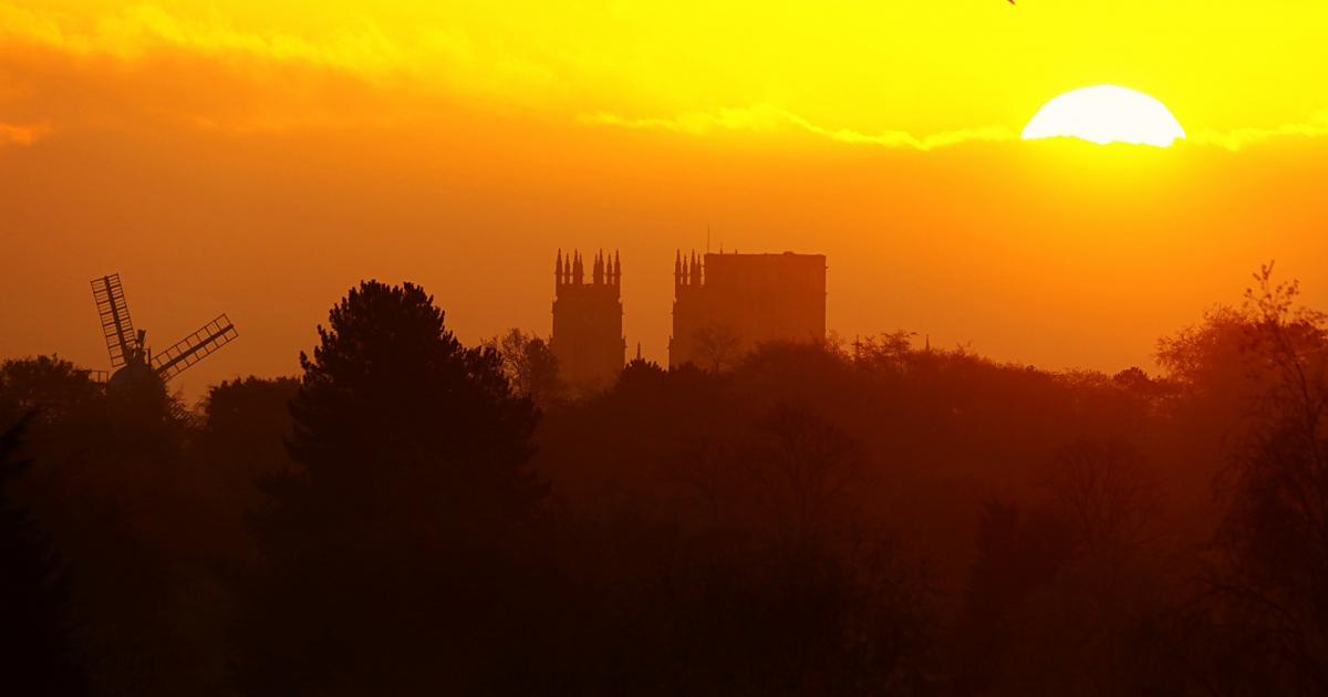 York Minster and Holgate Windmill pictured at sunrise