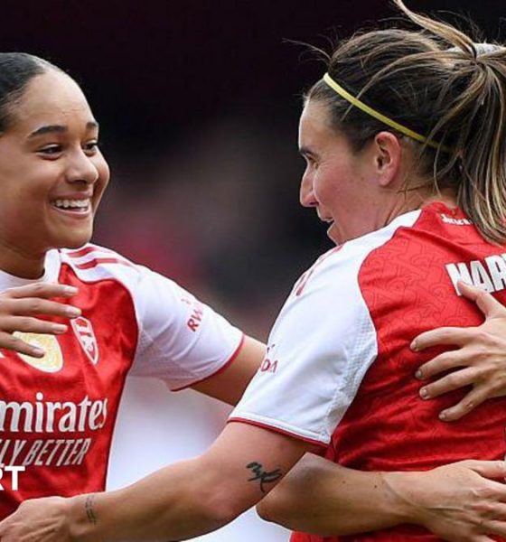 Olivia Smith nicks ball away from Lyon goalkeeper Christiane Endler