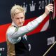 Neil Robertson holds his cue extension aloft