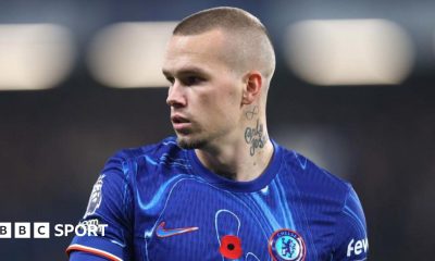 Mykhailo Mudryk looking to his right while playing in a Chelsea kit