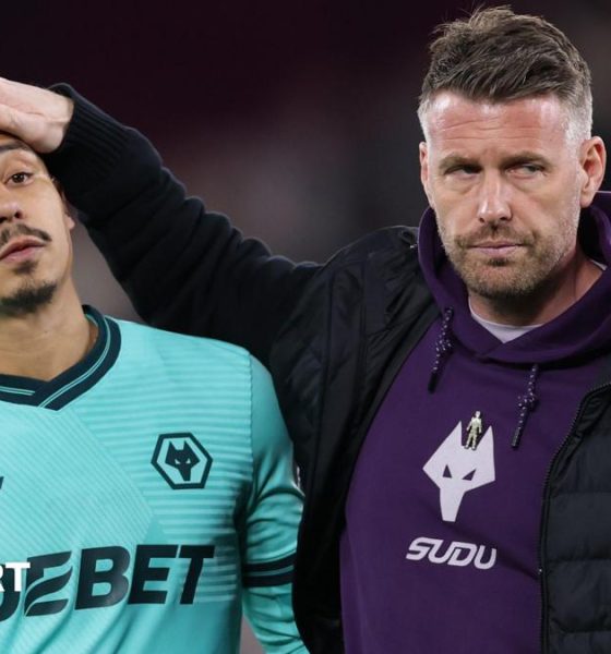 Rob Edwards with his hand on Andre's head