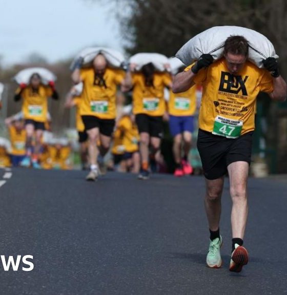 Hundreds take part in Gawthorpe coal-carrying race