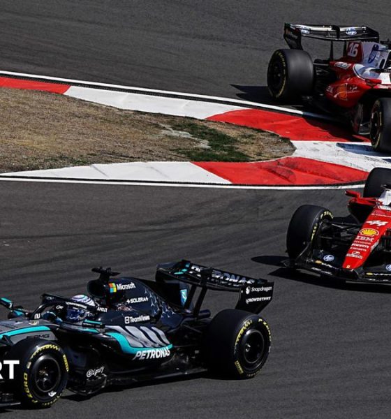 Mercedes' George Russell comes out of a hairpin ahead of Ferrari's Lewis Hamilton with Charles Leclerc immediately behind during the Chinese Grand Prix sprint race