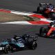 Mercedes' George Russell comes out of a hairpin ahead of Ferrari's Lewis Hamilton with Charles Leclerc immediately behind during the Chinese Grand Prix sprint race