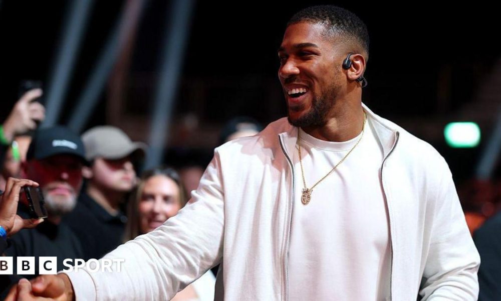 British boxer Anthony Joshua shakes hands at the fight between Deontay Wilder and Derek Chisora