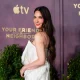 Olivia Munn can currently be seen on the Apple TV+ series "Your Friends & Neighbors," co-starring Jon Hamm.