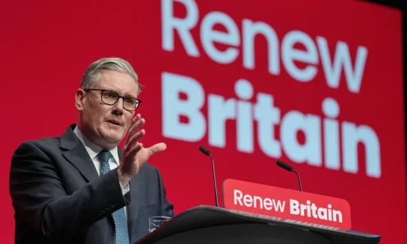 Britain's Prime Minister Keir Starmer gestures as he gives his keynote speech at the annual Labour Party conference in Liverpool, England, Tuesday, Sept. 30, 2025.