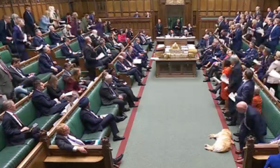 Empty benches behind the PM during his statement.
