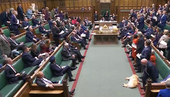 Empty benches behind the PM during his statement.