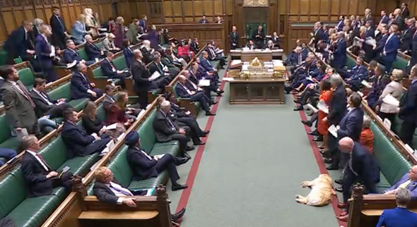Empty benches behind the PM during his statement.