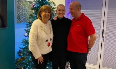 Lizzie with her parents