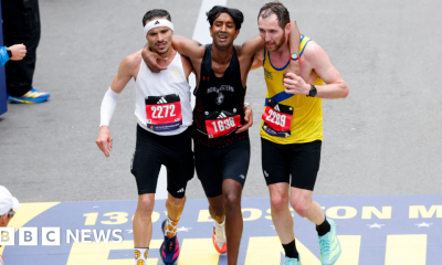Runners help exhausted man finish Boston Marathon