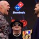 Tyson Fury screams at Arslanbek Makhmudov in jest at a news conference in London