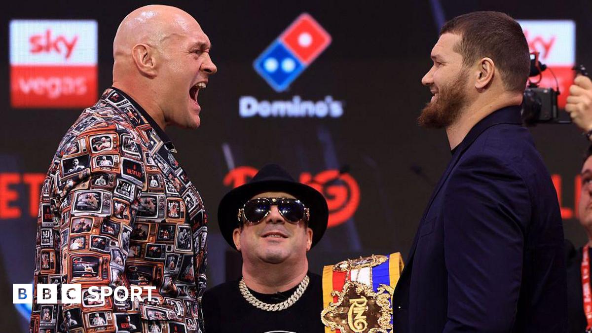 Tyson Fury screams at Arslanbek Makhmudov in jest at a news conference in London