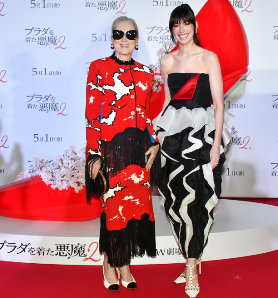 99 The Devil Wears Prada 2 Tokyo Fan Event Anne Hathaway In Black And Ivory Valentino Couture Silk Gown And Meryl Streep In Red And Black Chanel Metiers DArt Fringe Tweed Set