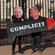 Protesters against Charles's state visit to Trump wear Charles and Trump masks and hold a prop missile saying COMPLICIT in front of Buckingham Palace