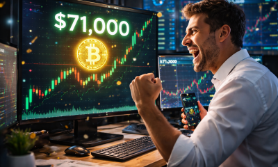 A trader celebrating a bullish Bitcoin chart
