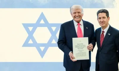 Donald Trump and ambassadord Christian Turner in front of the Israeli flag UK ambassador