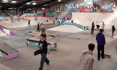 A mock-up photograph of what the Flo Skatepark would look like once opened with graffitti on the walls and young people walking over ramps with their skateboards