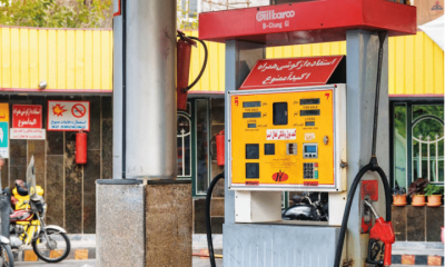 Colourful Gilbarco petrol pumps in empty gas station in Iran