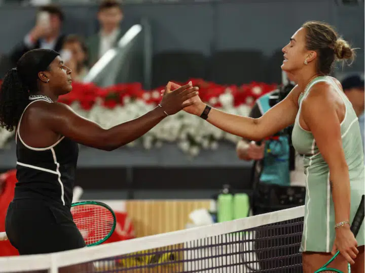 Hailey Baptiste of the US shakes hands with Belarus' Aryna Sabalenka after winning their Madrid Open quarterfinal at the Park Manzanares, Madrid, on April 28 2026.