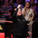 John Higgins celebrates victory over Ronnie O'Sullivan
