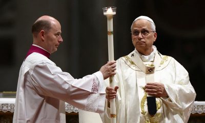 At Easter vigil, Pope Leo urges world not to grow numb to war
