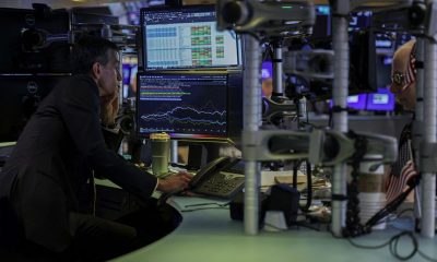 Wall St ends mixed, notches weekly gains as investors parse Middle East negotiations