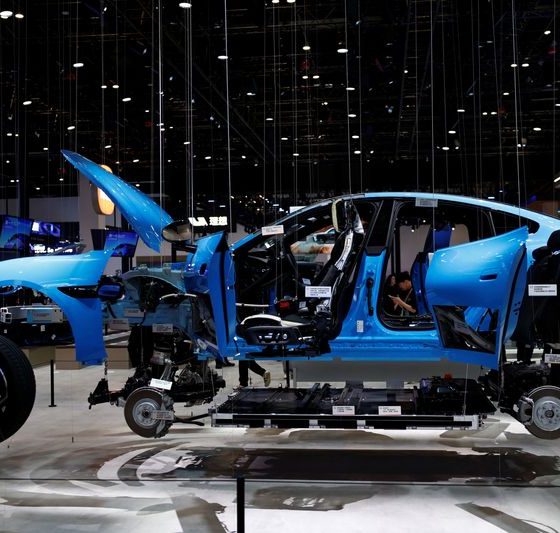 After call from Beijing, China’s auto industry races to embed AI in just about everything