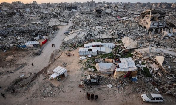 Israeli fire kills 12 in Gaza, medics say