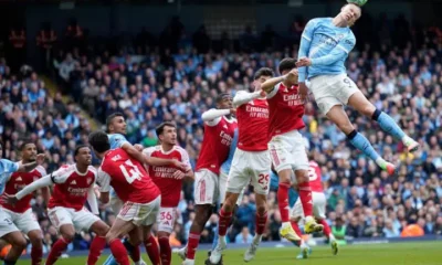 Manchester City's Erling Haaland heads the ball during the English Premier League soccer match between Manchester City and and Arsenal, in Manchester, England, Sunday, April 19, 2026.