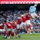 Manchester City's Erling Haaland heads the ball during the English Premier League soccer match between Manchester City and and Arsenal, in Manchester, England, Sunday, April 19, 2026.