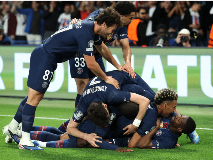 Ousmane Dembélé celebrates scoring his team’s fifth goal with his PSG teammates but Bayern roared back to keep the tie alive. Photograph: Alexander Hassenstein/Getty Images